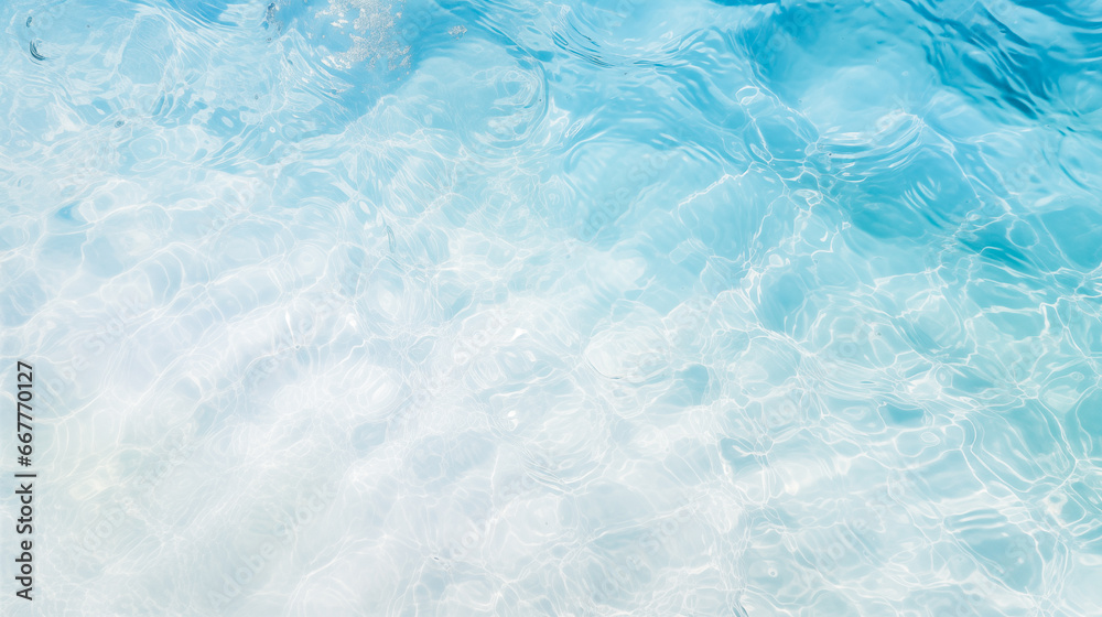 light blue rippled water surface with a slight wave pattern. The water is clear and reflecting the sunlight and has a slight sparkle. Water background.