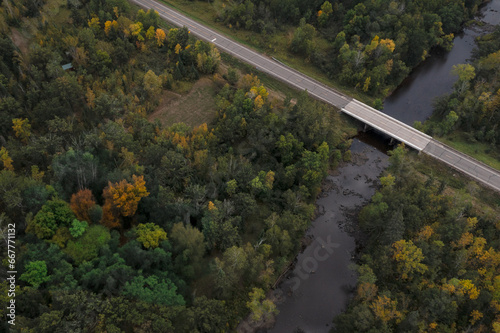 Road with Bridge Over the Snake River Through Autumn Forest