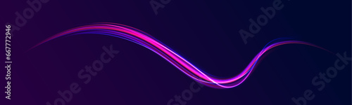 The effect of a long yellow and red path or autobahn at night. City light trails behind the traffic background. Abstract background in blue and purple neon glow colors. 