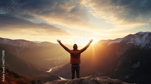 Positive man celebrating with arms raised up at Mountain landscape at sunset, Generative AI photo