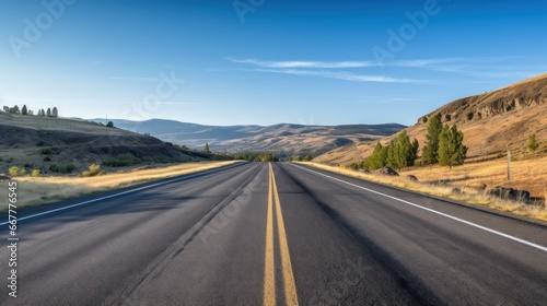Empty highway with clear demarcations in the early hours. © sopiangraphics