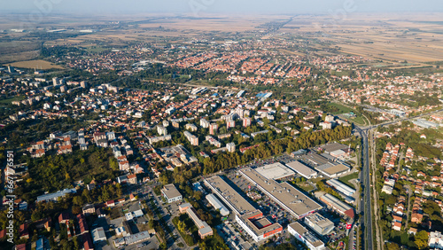 Aerial panorama of a European town at sunrise, with magnificent colorful sky and warm light, Pancevo Serbia.