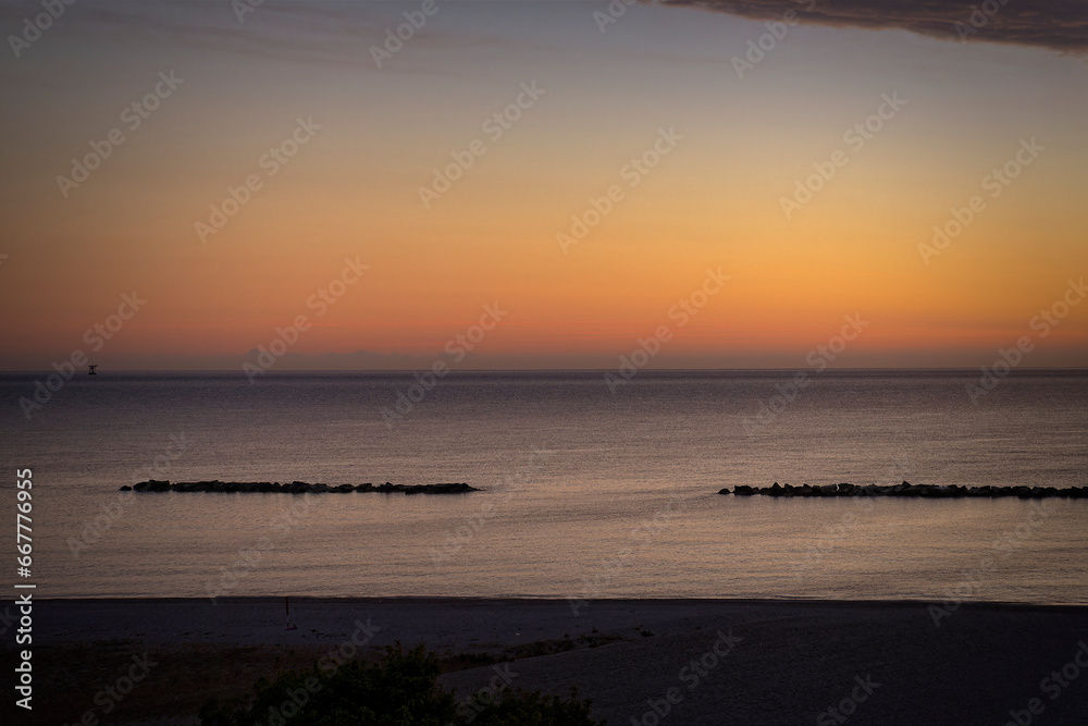 sunrise over the sea, lido di fermo, Marche, Italy sunrise over the sea, lido di fermo, Marche, Italy