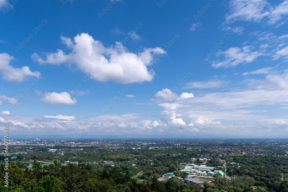 View of city and green forest at Wat Phra That Doi Kham. Famous temple at  Chiang Mai Thailand