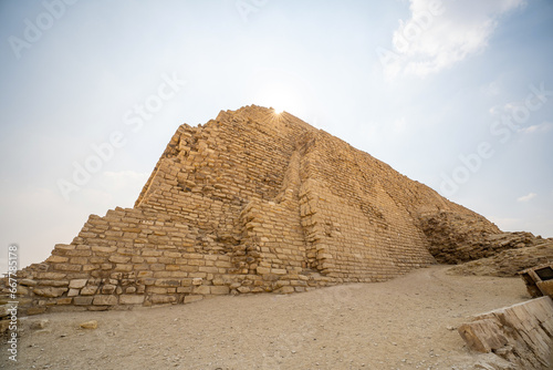 Step pyramids of Zoser in Saqqara in Egypt's capital Cairo during a sunny summer day photo