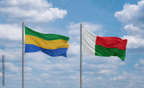 Madagascar and Gabon flags, country relationship concept