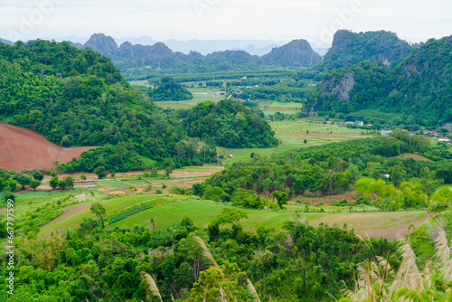 An aerial view of a hill that has been cleared for agriculture in Loei Province, Thailand.