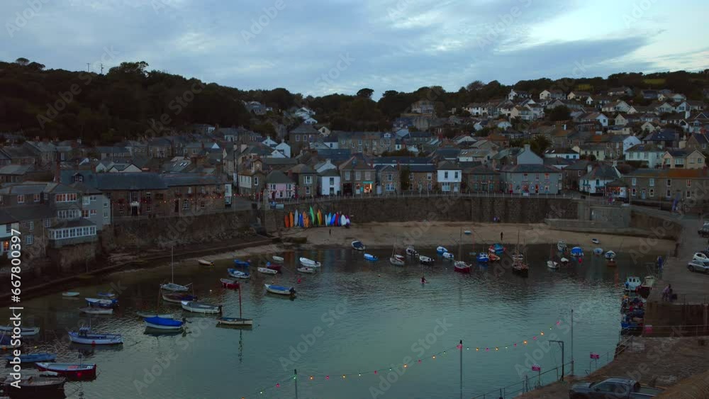 Harbor of Mousehole in Cornwall at Sunset Harbor of Mousehole in Cornwall at Sunset