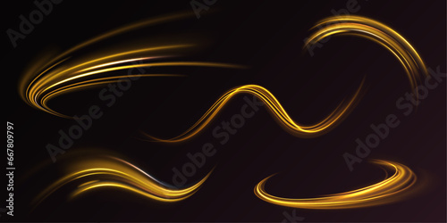 Shine magic gold swirl with flare sparkles. Curved yellow line light. Long exposure light painting photography, curvy lines of vibrant neon metallic yellow gold against a black background.
