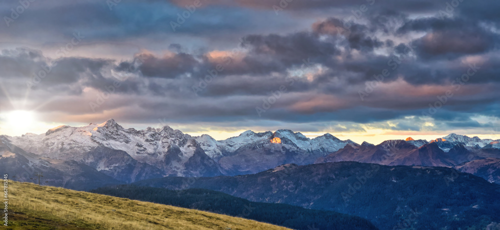 First lights coloring the first snow in the mountains. First lights coloring the first snow in the mountains.