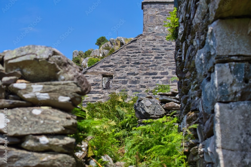 old stone house ruins in the mountains