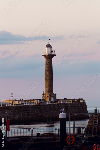 Whitby west lighthouse with a cool sunset back scene