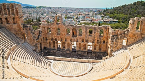 A stone Roman theatre structure of Odeon of Herodes Atticus in Athens. Historical and architectural building in Acropolis of Athens, Greece.