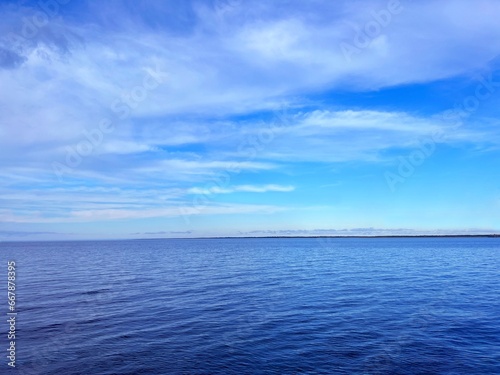 Blue sea water  sky  clouds  horizon.