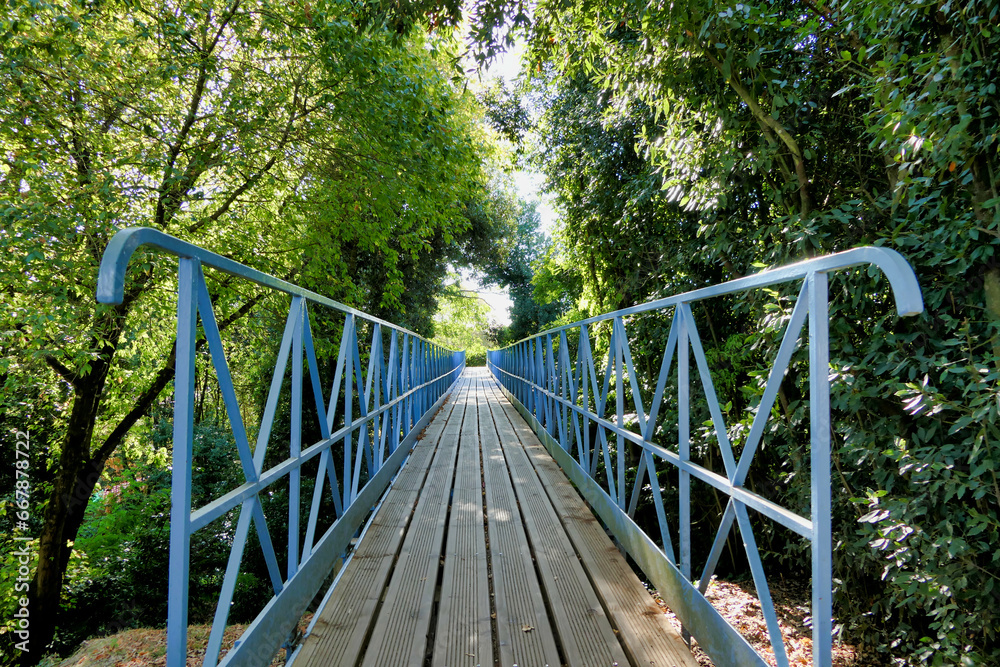 Boardwalk platform crossing the road from Parc Mauresque to the Observatoire Saint-Cecile in Arcachon, France
