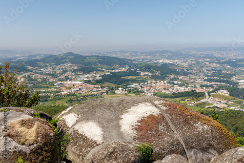 Panoramic view of Guimaraes from Santa Catarina hill. Guimaraes is one of the finest cities in northern Portugal, and is fondly regarded by the portuguese as the birthplace their country.  photo