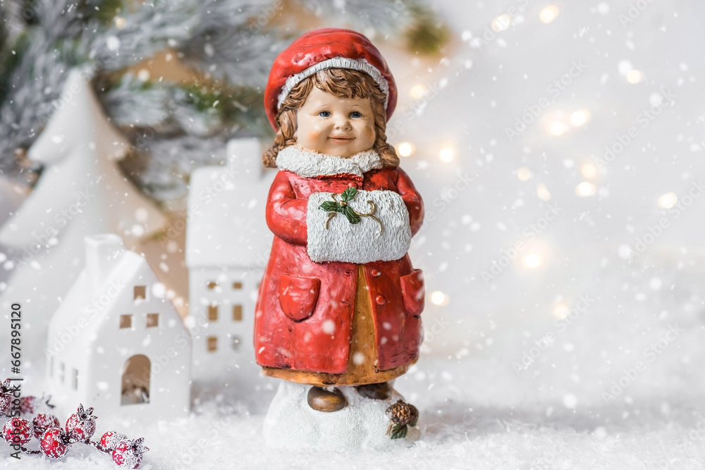 Retro Christmas card with a cute figure of a child on a snowy background. A girl in a red coat warms her hands in a muff. The concept of the winter holiday new year 2024. Retro Christmas card with a cute figure of a child on a snowy background. A girl in a red coat warms her hands in a muff. The concept of the winter holiday new year 2024.