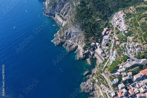 Aerial view of Riomaggiore, Riomaggiore in the province of La Spezia in Liguria. An ancient village on the Riviera di Levante, it constitutes the easternmost and southernmost of the Cinque Terre photo