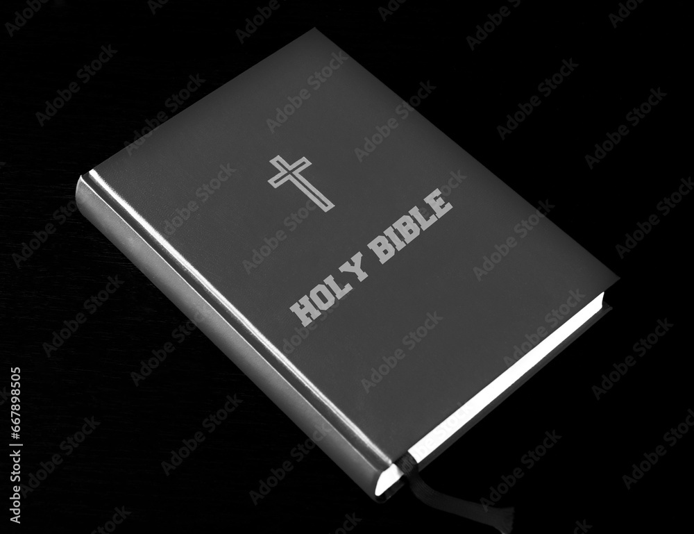 A Holy Bible book on a black background A Holy Bible book on a black background