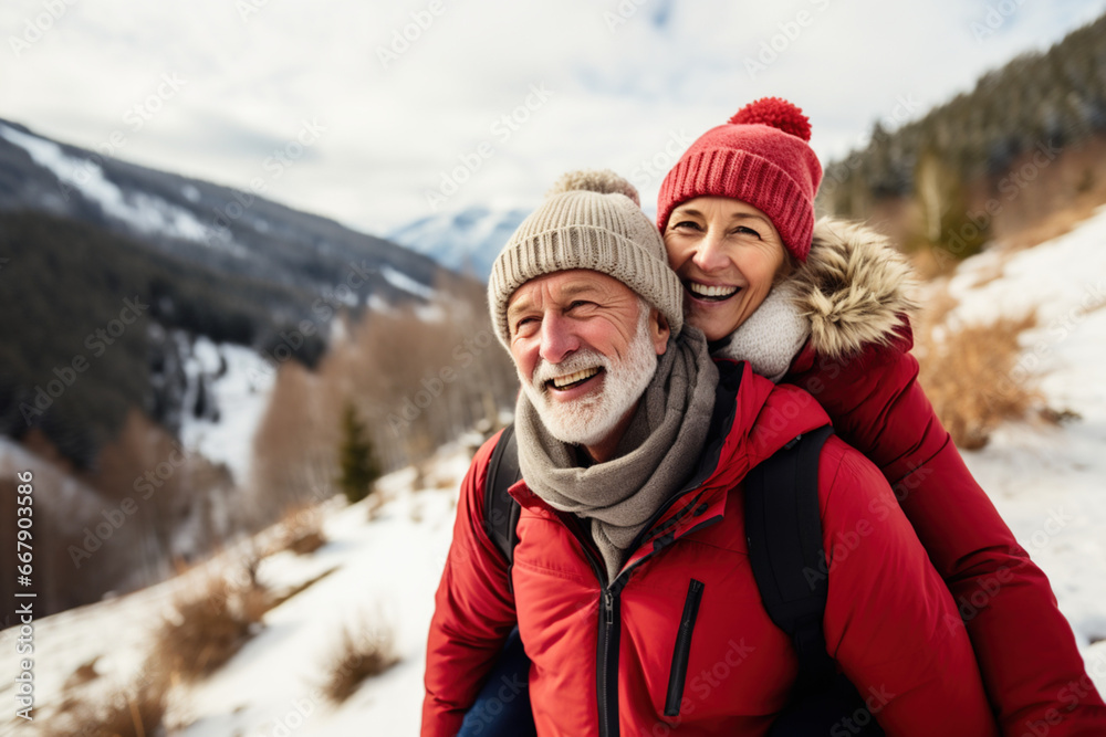 Selfie portrait of senior active smiling mature couple snowboarding skiing in glasses look happy on top of mountains winter day time, happily retired. Active sport elderly healthy lifestyle concept