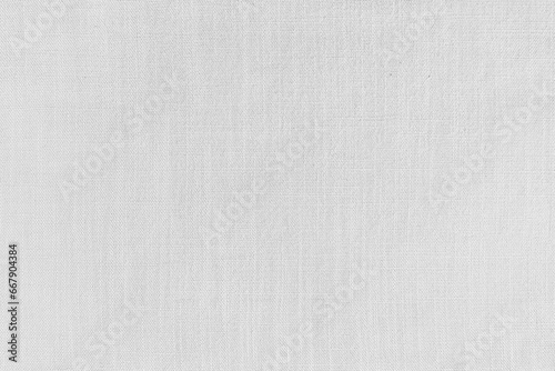 Texture background of white linen fabric. Textile structure, cloth surface, weaving of natural cotton fabric closeup, backdrop, wallpaper. photo