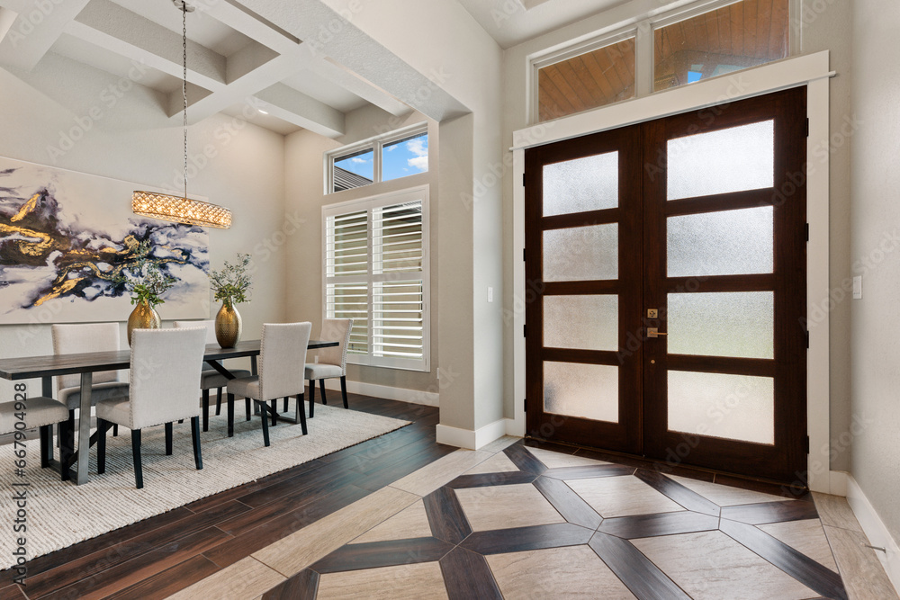 Fototapeta premium a home entryway with a front door