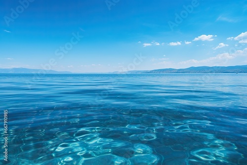 Side view of the transparent blue sea and sky. Beautiful seascape. Sea holiday and travel concept. Generated by artificial intelligence © Vovmar