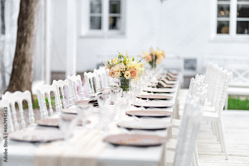 Beautiful table set for an event party or wedding reception . restaurant interior Beautiful table set for an event party or wedding reception . restaurant interior