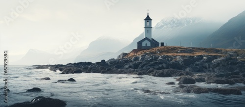 solitary church on rocky shoreline