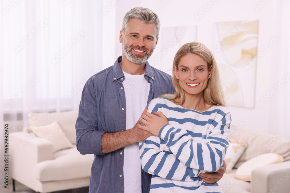 Portrait of happy affectionate couple at home. Romantic date Portrait of happy affectionate couple at home. Romantic date