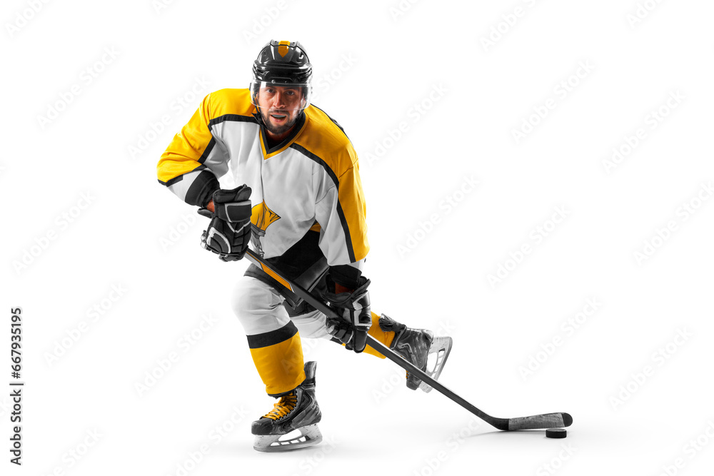 Athlete in action. Hockey. Professional hockey player in the helmet and gloves on white background. Hockey concept Athlete in action. Hockey. Professional hockey player in the helmet and gloves on white background. Hockey concept