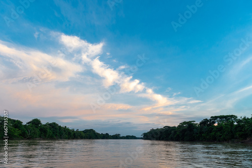 Sunset from the Guayabero River with beautiful colored sky. Meta, Colombia. 