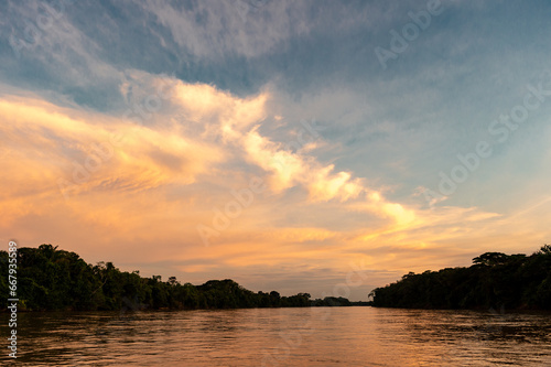 Sunset from the Guayabero River with beautiful colored sky. Meta  Colombia. 