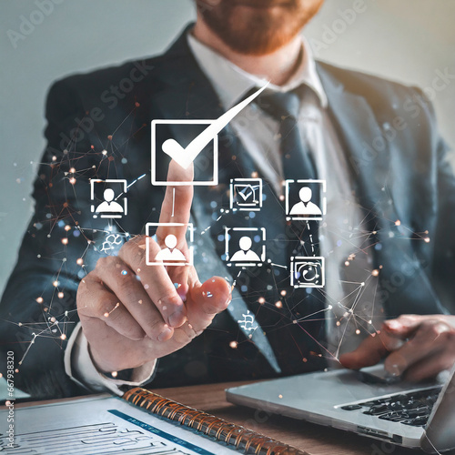 Human resources management, HR, Recruitment, Employment, Teamwork, Leadership and teambuilding. Businessman select of checkbox and Fill out an online employee assessment form on network