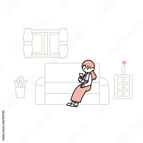自宅でスマホを見る女性