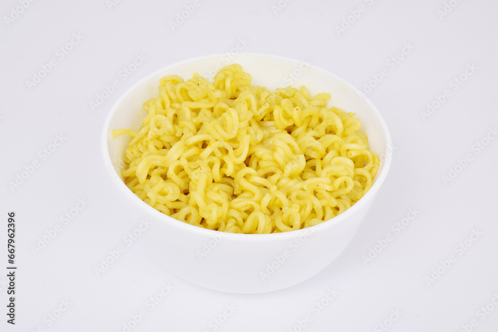 Cooked yellow noodles in bowl on white background Cooked yellow noodles in bowl on white background