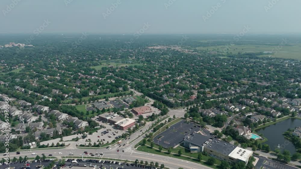 Wide above aerial view. Residential houses in suburbs near city . Sunny day time Wide above aerial view. Residential houses in suburbs near city . Sunny day time