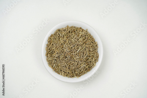 Top view of cumin seeds isolated on white background