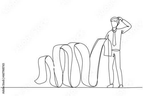 Single continuous line drawing of businessman holding a long billing paper dangling all the way to the floor, one of his hands scratching his head. Confused how to pay the bill. One line design vector