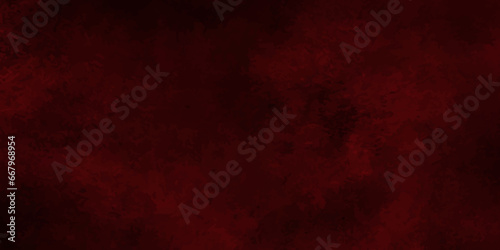Red powder explosion cloud on black background. Freeze motion of red color dust particles splashing.old style grunge texture background for web design and graphics design.