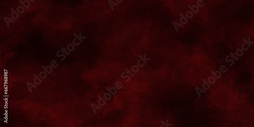 Red powder explosion cloud on black background. Freeze motion of red color dust particles splashing.old style grunge texture background for web design and graphics design.