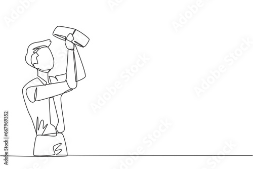 Single continuous line drawing of businessman stood holding and turning an empty wallet. Man who go bankrupt in running a business. Don't have any money at all. One line design vector illustration