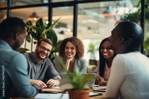 Group of multiethnic business people working together in creative office. © Viewvie