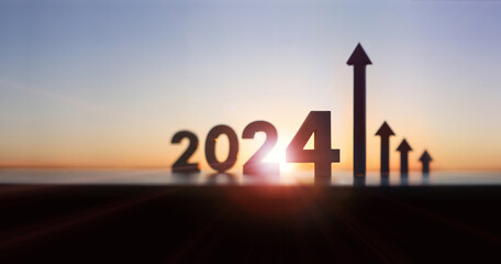 Arrows and graphs rising high, 2024 new year sunrise and bright rising sun and stock finance economic industry growth and success, investment goals and objectives concept
