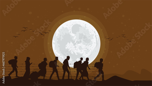 The image shows a group of people, silhouettes, walking in a line in front of a bright full moon. The ground is covered in snow, and the people are wearing snowshoes. The image is dark and atmospheric