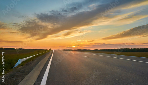 Empty asphalt road and beautiful sky at sunset, panoramic view. High quality photo