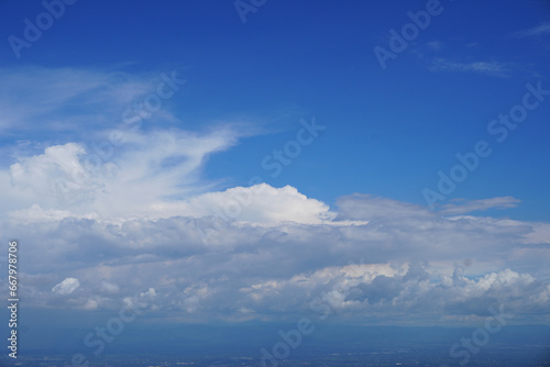 Blue sky and white clouds, beautiful cloudscape background © Cheattha