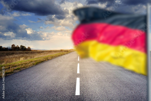 Eine Straße und Flagge von Deutschland photo