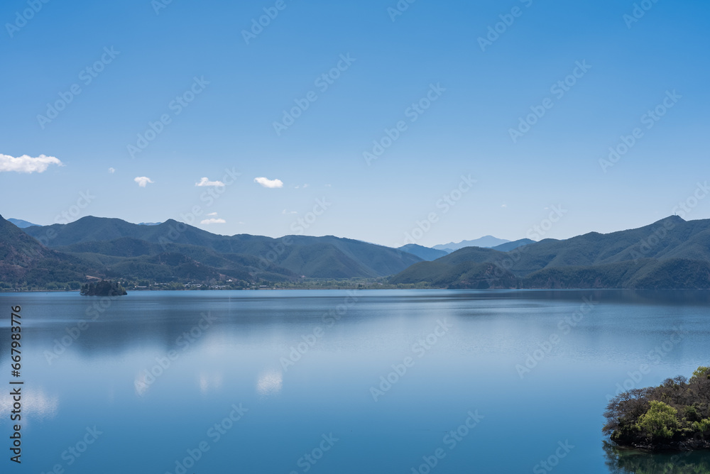 The Blue Sky and Clear Water of Lugu Lake in China