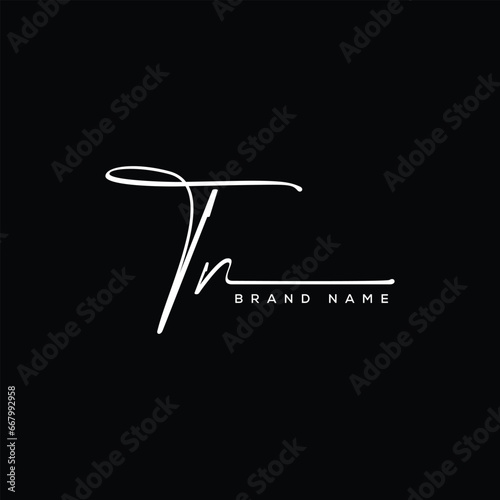 Foto TN letter beauty handwriting vector logo.